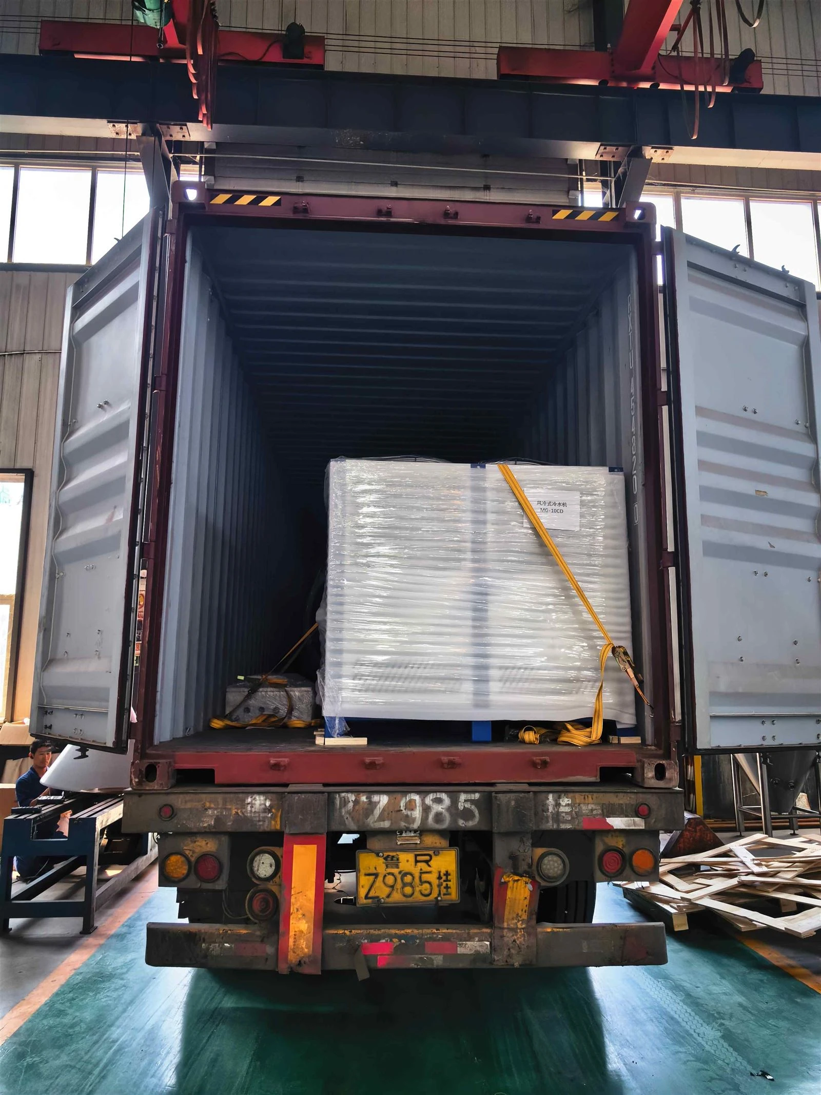 Brewery equipment loaded into shipping container Brewery equipment loaded into shipping container